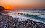 夕阳 海浪 海滩 鹅卵石