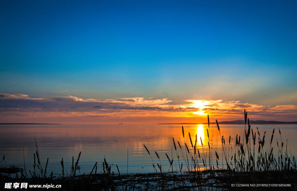 海邊夕陽(yáng)風(fēng)景天空云彩