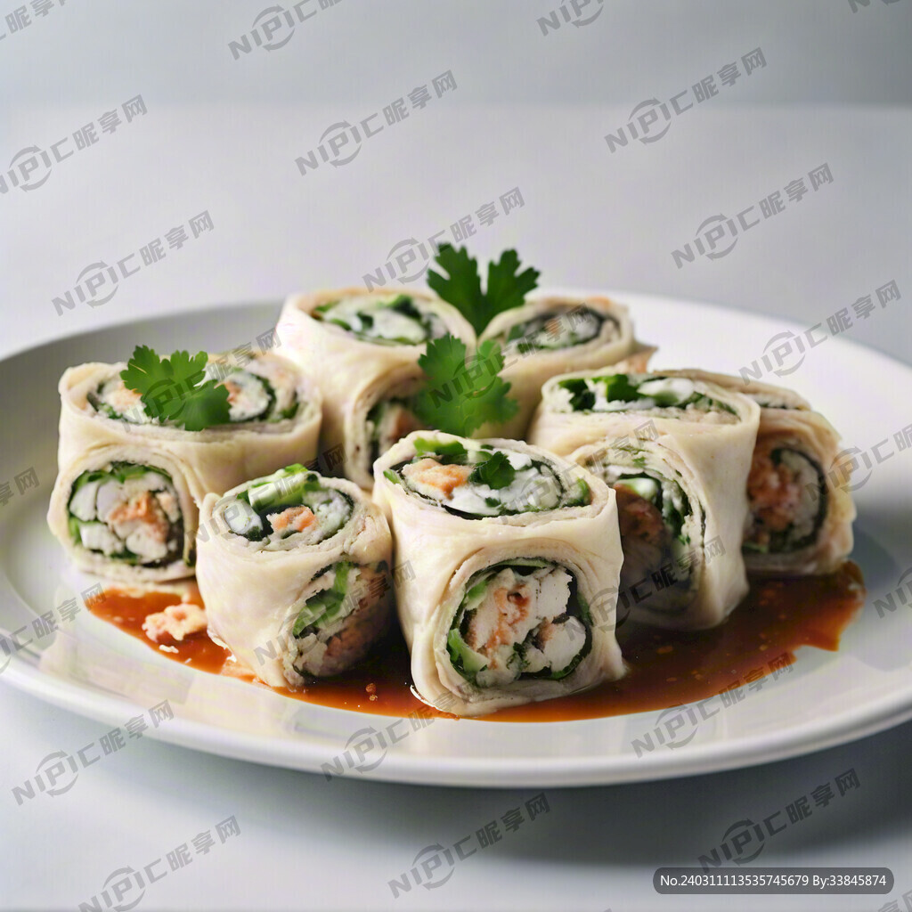 一個白色的盤子裝白色的魚肉卷