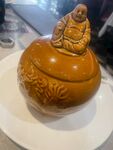 彌勒佛坐于雕花南瓜擺件