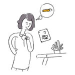 女士思考桌上日歷與綠植