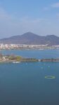 海濱風光碧海藍天遠山景