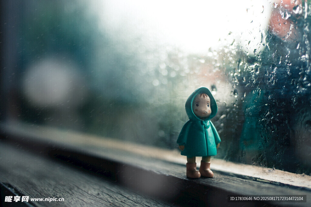 雨中撐傘的孤獨(dú)小女孩