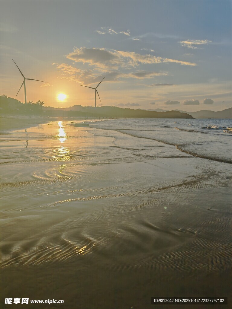 海邊日落與風(fēng)車美景
