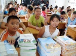 国务院：城市义务教育从2008年起免除学杂费