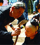 苗寨 剃头