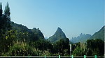 绿林簇拥的山锥