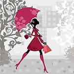 打着雨伞漫步的都市女郎