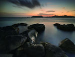 海滩 夕阳 石头