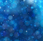 蓝色雪花光晕背景素材