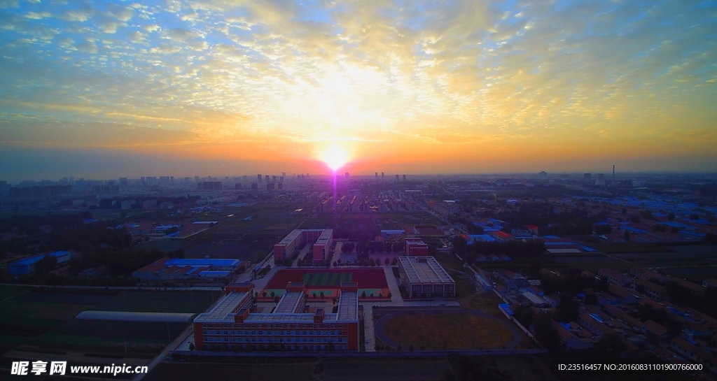 航拍城镇学校日出