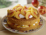 黄桃水果蛋糕摄影图