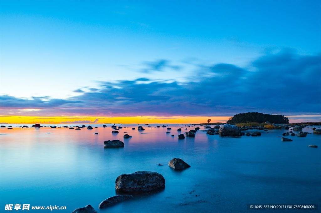 夕阳海面碉石风景