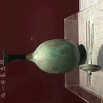 长颈带盖铜瓶