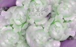 家和富贵玉雕花朵电视背景墙