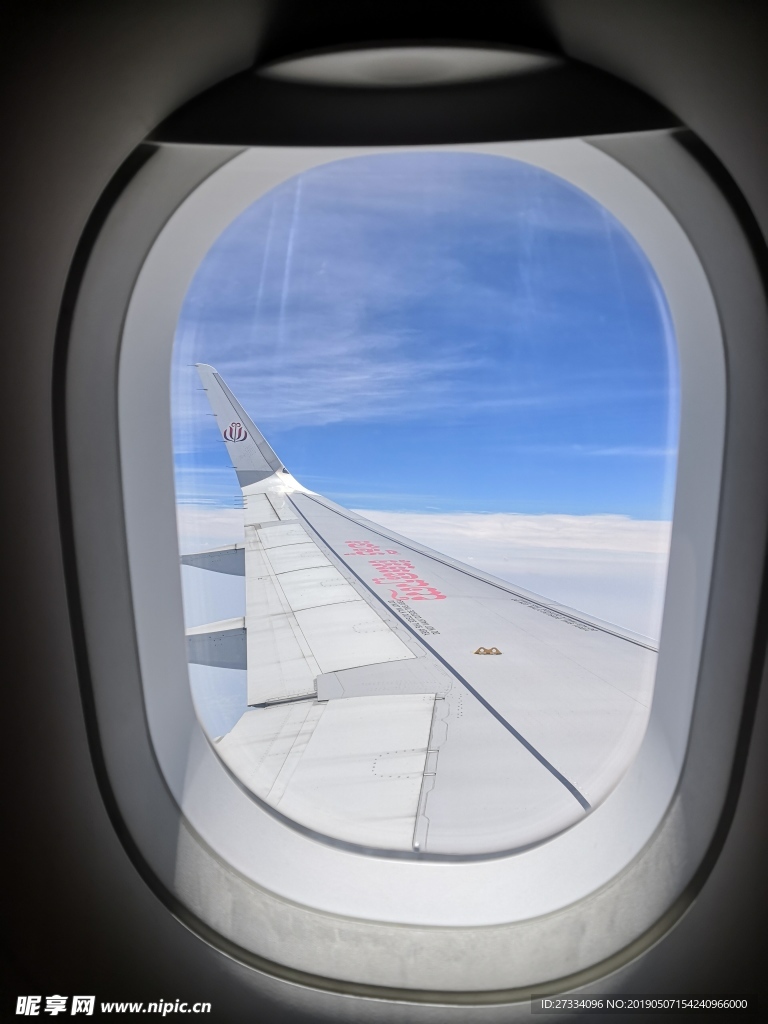 JC航空 飞机窗 天空 风景