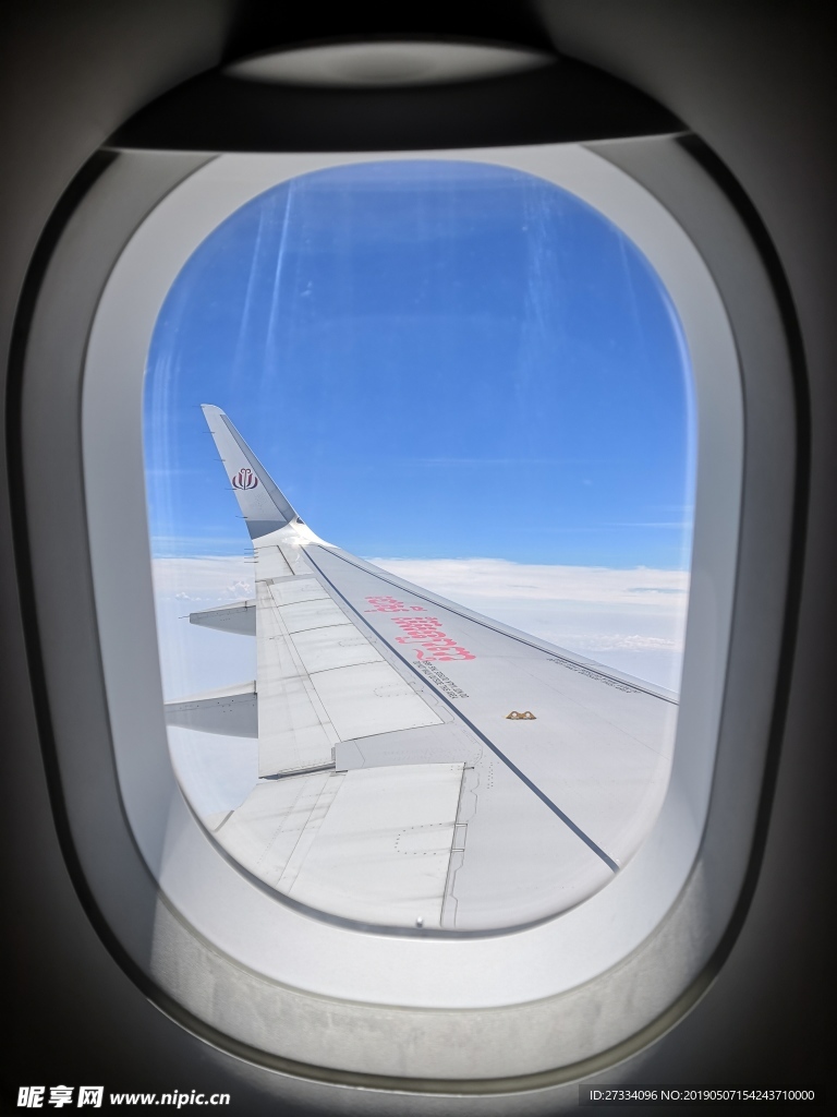 JC航空 飞机窗 天空 风景