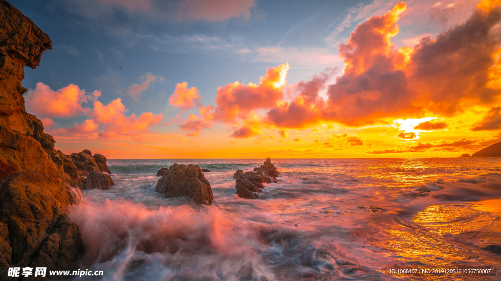 大海礁石夕阳风景图片