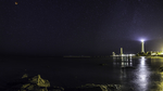 海边灯塔海水夜景星空