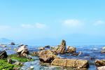 海浪岩石天空背景
