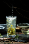 绿茶茶叶玻璃杯泡茶背景素材