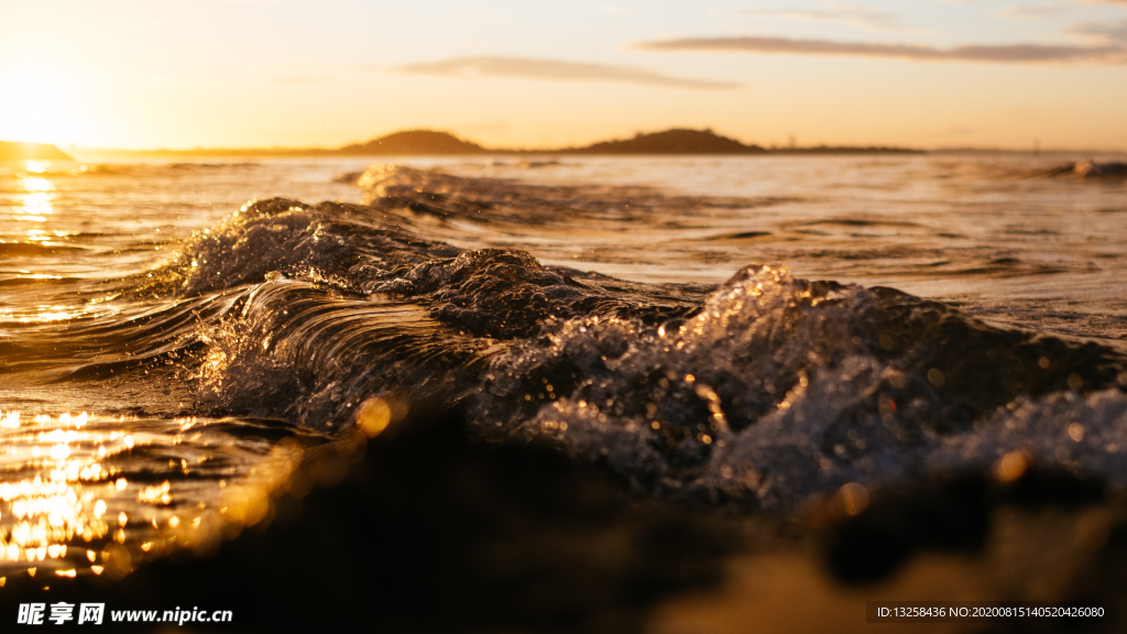 大海浪花海水沙滩夕阳风景