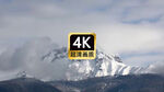 宣传片素材云雾翻滚的雪山山顶