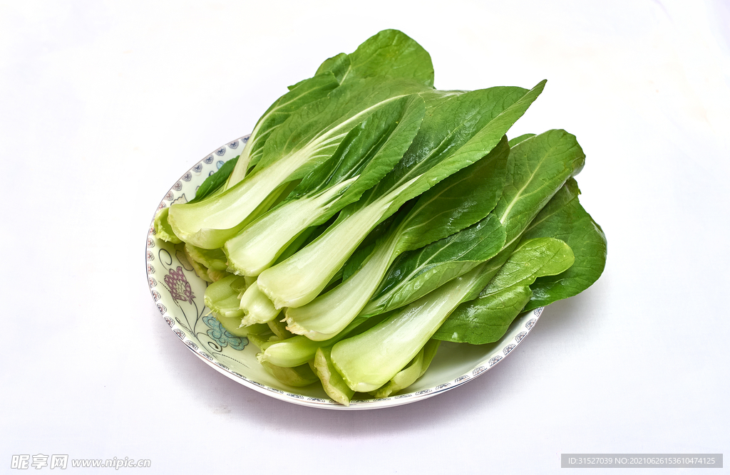 盘里的青菜摄影图