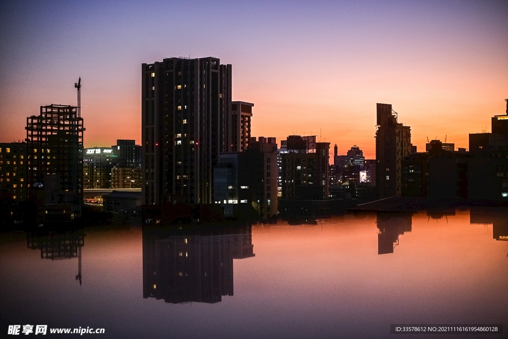 城市都市晚霞夕阳江边景观