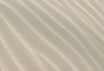 高清米白色沙子背景图