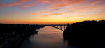 高清夕阳航拍外国城市大桥河流