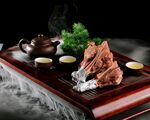 华鼎手抓扇子骨