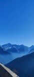 折多山观景台蓝天白云高原雪山草