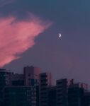 建筑住宅楼与明月白云