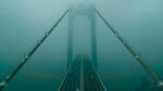 云雾包围若隐若现的五峰山大桥