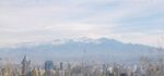 蓝天白云 城市建筑 雪山