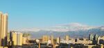 城市建筑 雪山 蓝天白云