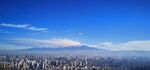 蓝天白云 雪山 城市