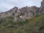 黄山奇石鳌鱼吃螺丝