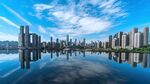 重庆市中心建筑城市倒影蓝天白云