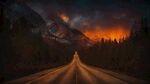 夜晚高山下的高速公路