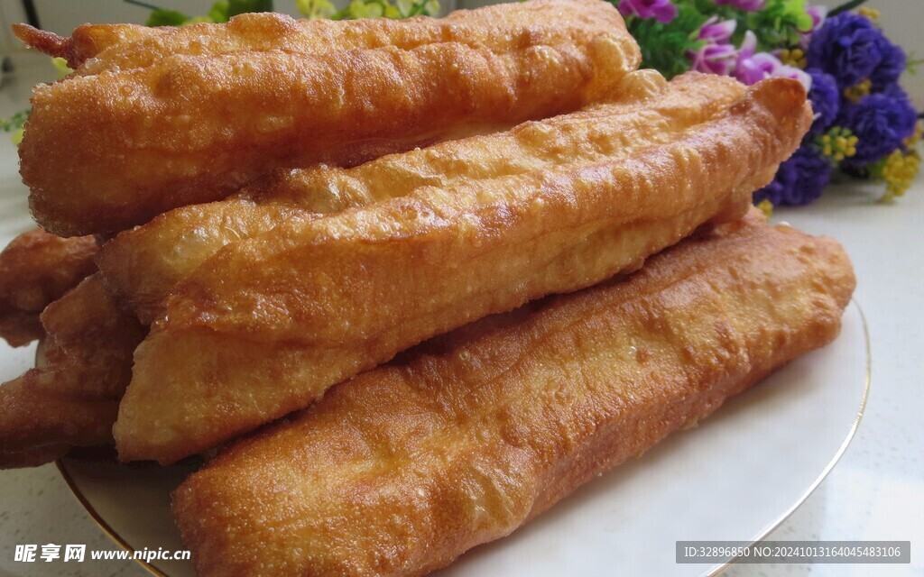 油条摄影图__传统美食_餐饮美食_摄影图库_昵图网