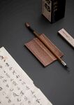 毛笔承实