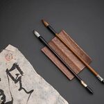 毛笔承实