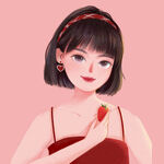红衣少女手持草莓甜美模样