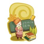 女教师在黑板前教学场景