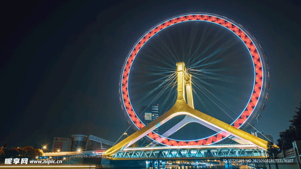 璀璨夜景中的摩天轮与桥梁