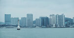 海滨城市高楼与海上船只