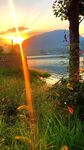 夕阳下的草地与远方景色