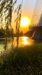 夕阳下河畔桥梁美景